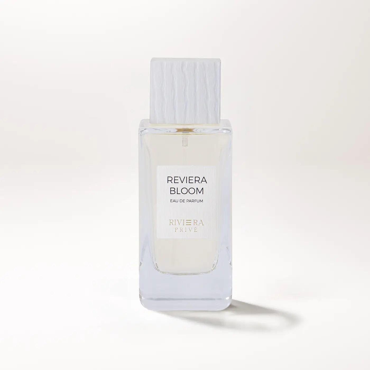 Riviera_bloom_Riviera_Prive_White_Background_Bottle.webp